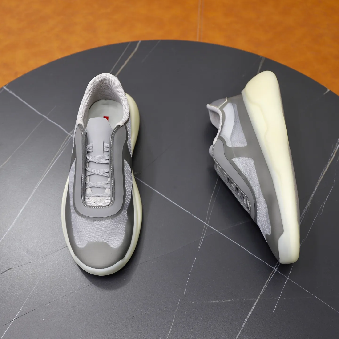 Men's Shoes 💰760💰 PRADA America's Cup Recycled Nylon and Bike Fabric Sneakers Practical and innovative, these regenerated nylon sneakers are modern, with lightweight soles and minimalist details. The upper is decorated with temperature-locking adhesive tape, screen-printed ADA logo, nylon loop shoelaces, T sole, made of ultra-light foam rubber filling material, rubber pattern texture, sole height: 40 mm, removable fabric-covered insole, Size 39-44